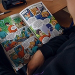 4 z 4 Uczeń czyta komiks o zmianach klimatycznych.jpg